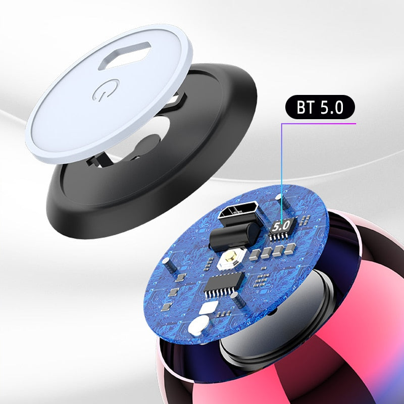 Close-up of electronic components with Bluetooth 5.0 label on a white background. Dragon Mini Speaker Features - 9D Bass Technology | Smart Glow Connect