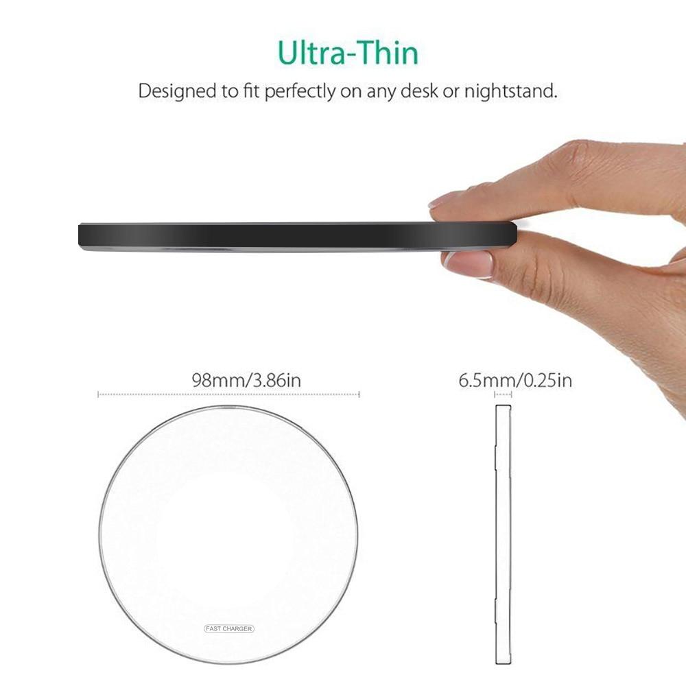 Thin black circular object held by a hand with measurements displayed. Dragon W9 Charger Size Comparison - Compact Design | Smart Glow Connect